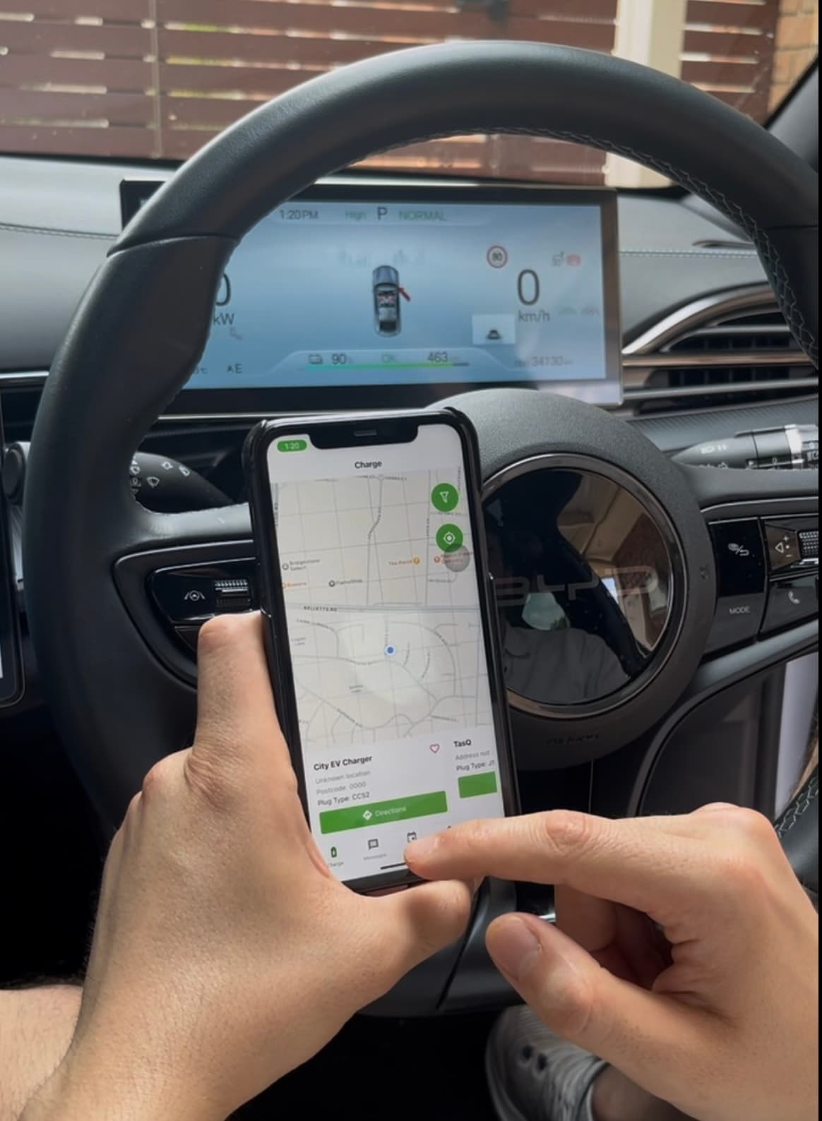 Driver booking a charger in the car